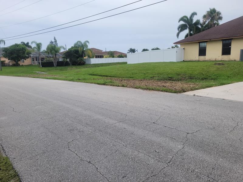 Cleared yard and roadside after debris removal